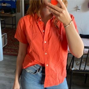 Large, orange button up